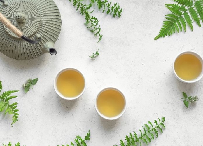 Clean herbal tea concept with minimal background, gentle herbal tea for body cleanse support